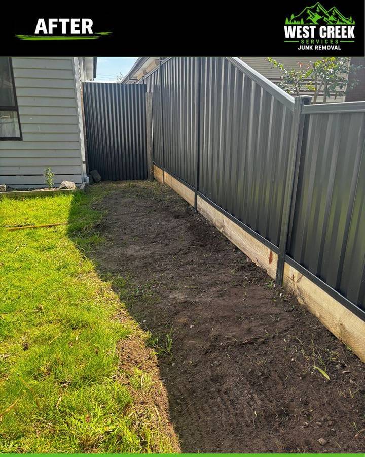After: Side path cleared back to bare soil