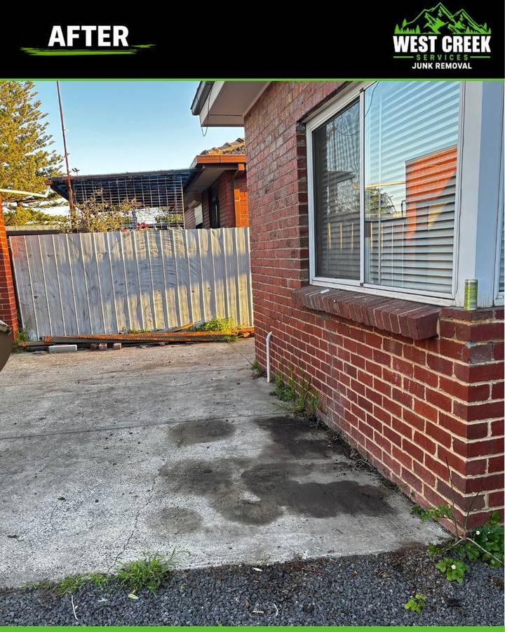 After: Driveway cleared beside the house