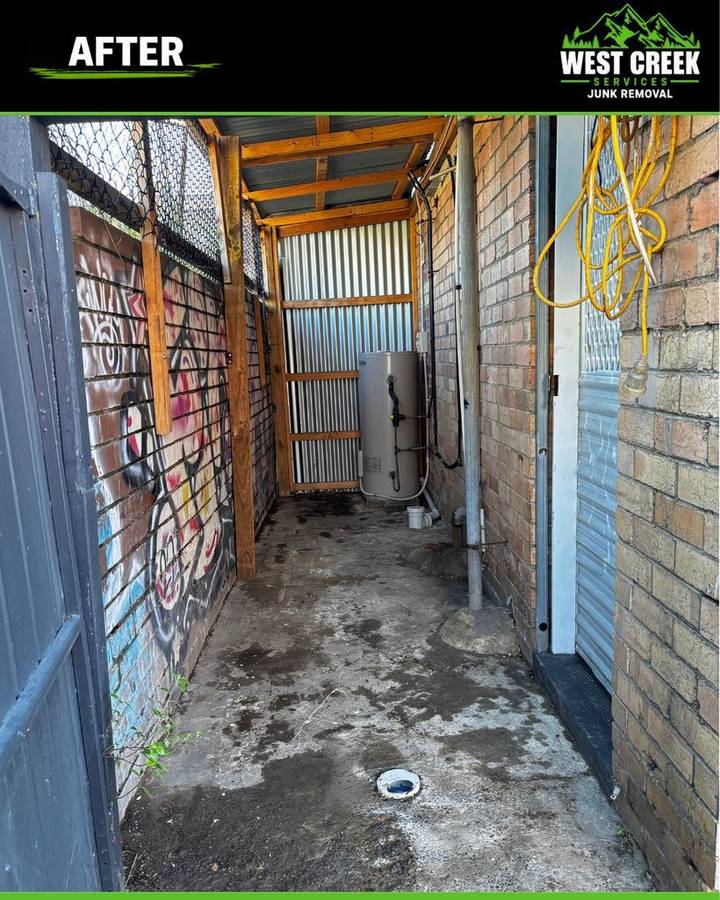 After: Walkway cleared back to the hot water unit