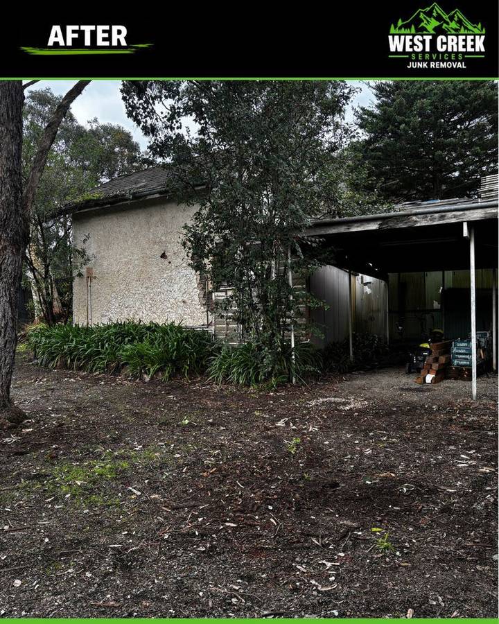 After: Yard beside the carport cleared